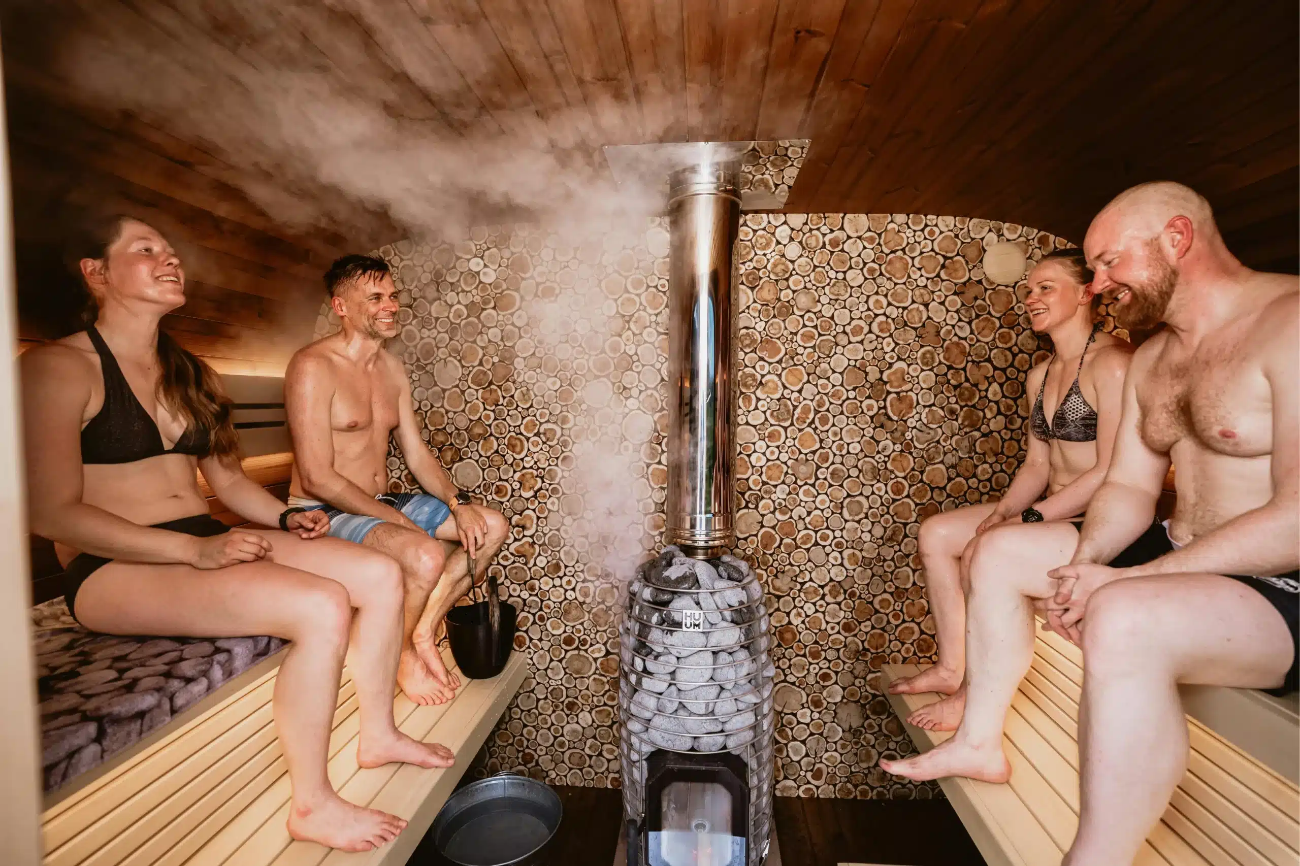 Poêle à bois ou électrique pour sauna : Le guide complet 2026 5 taille sauna exterieur jardin njord 2 scaled